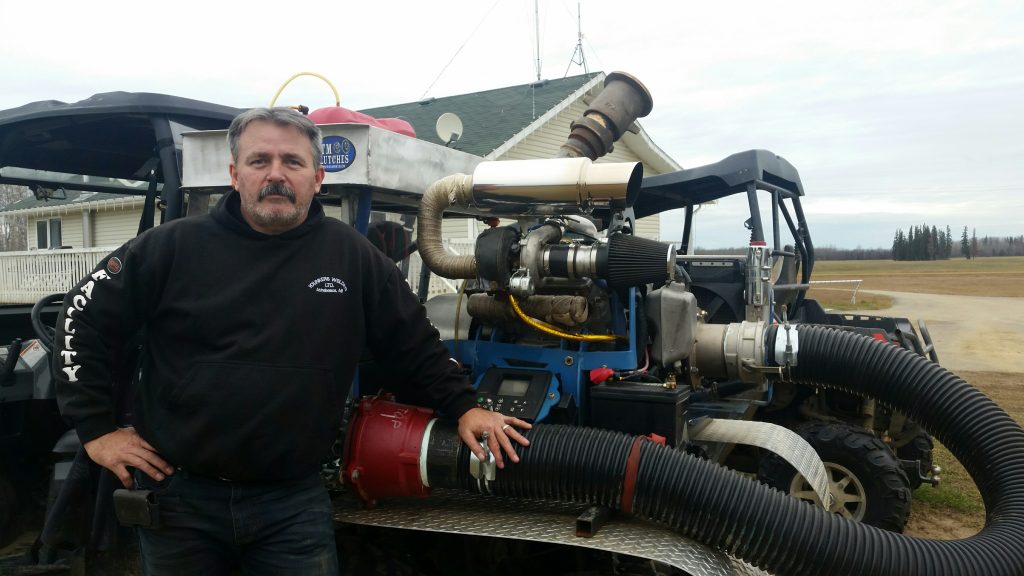 Kevin Younker and his transportable lightweight water pump.