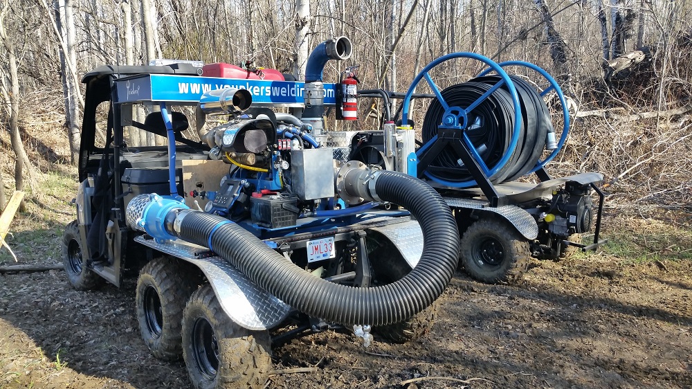 Trident water pump mounted on an all-terrain vehicle