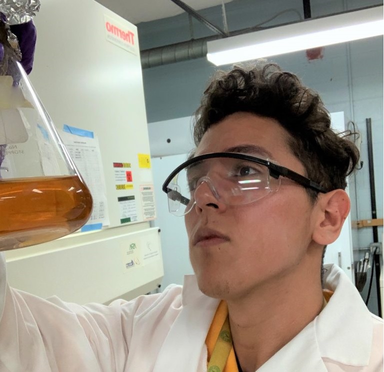 A member of a University of Alberta research team investigates various organisms that can break down lignin to make biofuels.