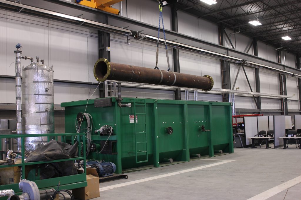 A photo of a custom built piece of testing equipment called ELDER that replicates underground pipeline conditions. 
