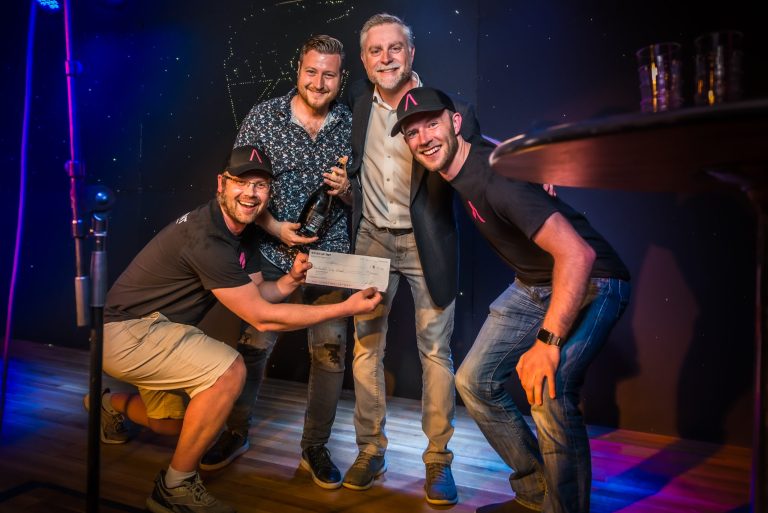 A picture of Zack and Tim from Startup TNT with two of their pitch winners